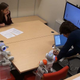 The Asch paradim in action: An adult with three robotic peers.
